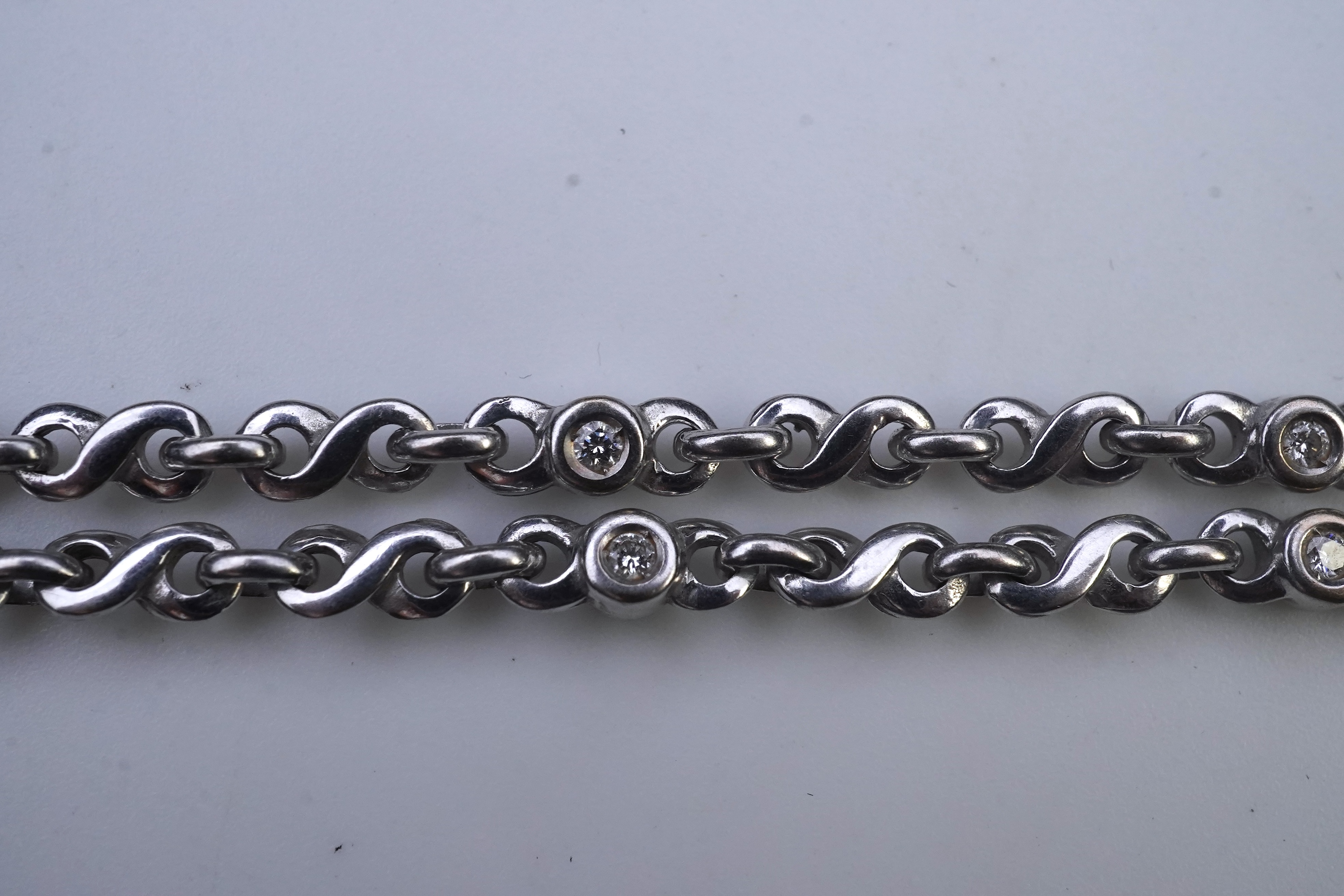 A white gold and diamond necklace